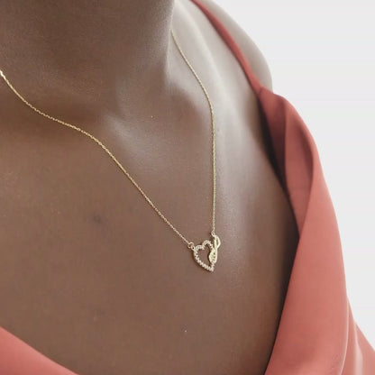 Collar de infinito con corazón en oro sólido de 14 k